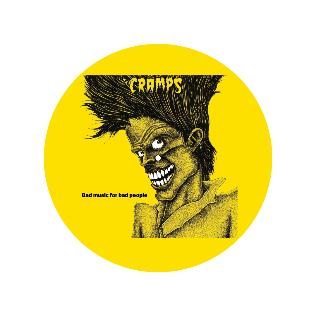 Album cover with a stylized face and text 'The Cramps' on a yellow background