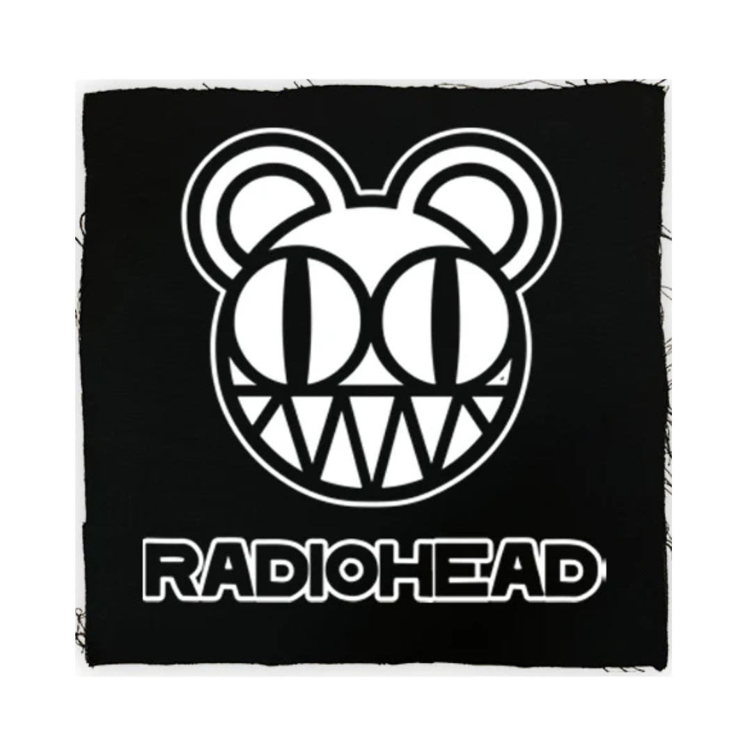Black blanket with Radiohead logo featuring a bear face design.
