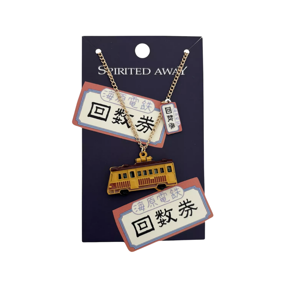 Keychain with train design on a 'Spirited Away' branded card
