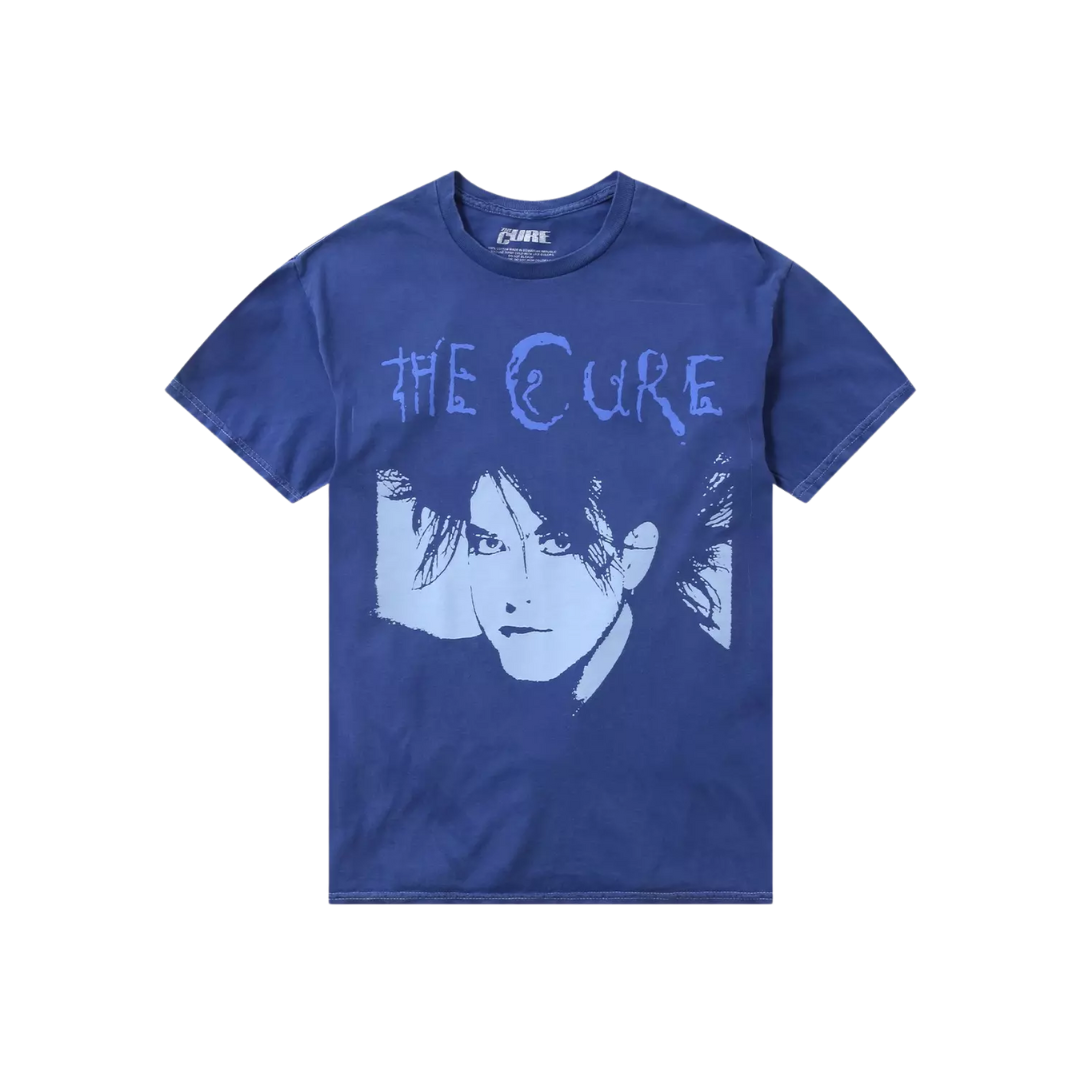 Blue t-shirt with 'The Cure' band logo on a white background
