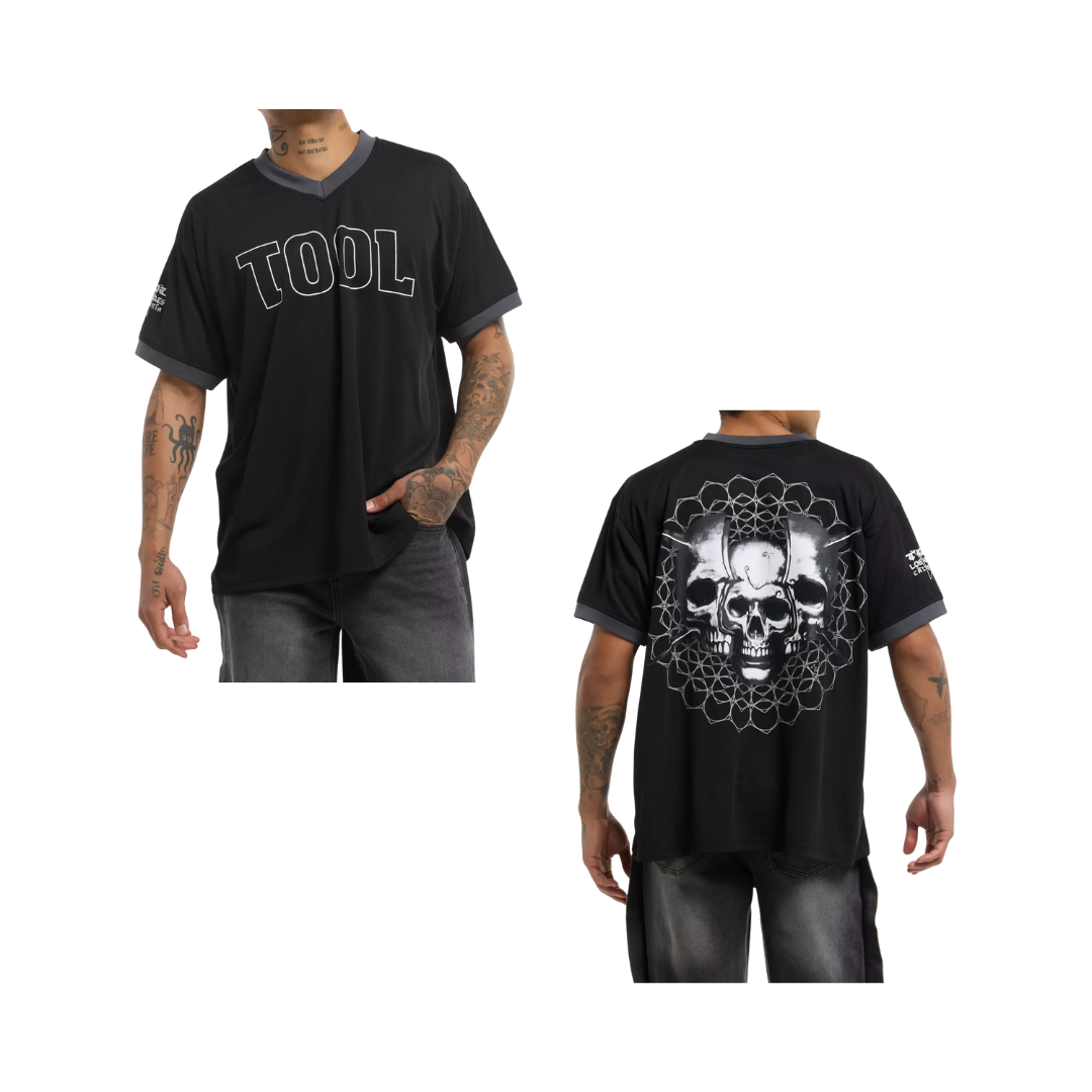 Black t-shirt with 'TOOL' logo on front and skull design on back, worn by a person.