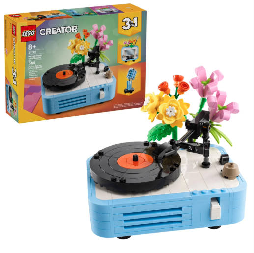 LEGO Creator set with a turntable and flowers, next to its packaging.