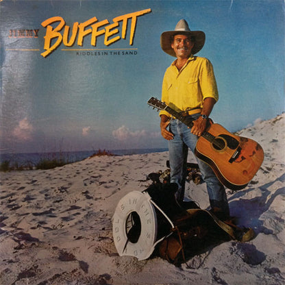 Jimmy Buffett : Riddles In The Sand (LP, Album, Glo)