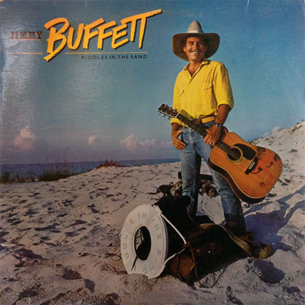 Jimmy Buffett : Riddles In The Sand (LP, Album, Glo)
