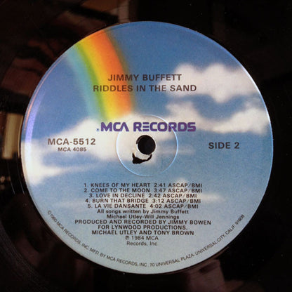 Jimmy Buffett : Riddles In The Sand (LP, Album, Glo)