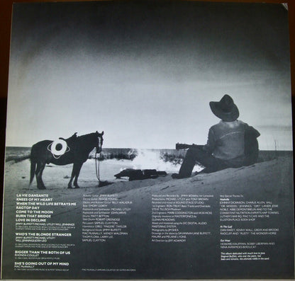 Jimmy Buffett : Riddles In The Sand (LP, Album, Glo)