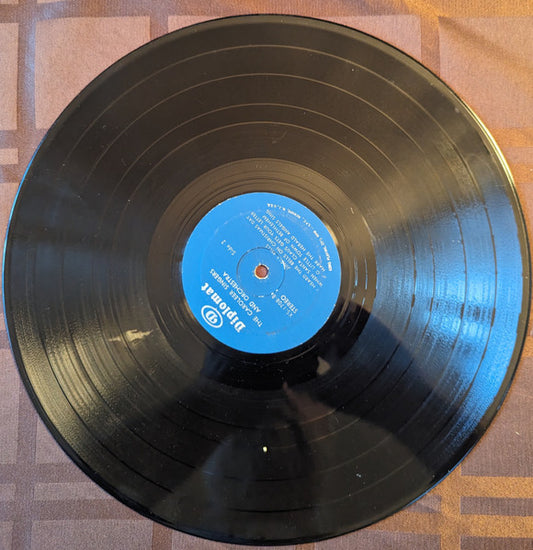 The Caroleers, The Peter Pan Orchestra : Rudolph The Red Nosed Reindeer (LP)