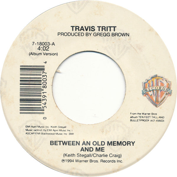 Travis Tritt : Between An Old Memory And Me (7", Single)