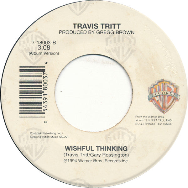 Travis Tritt : Between An Old Memory And Me (7", Single)