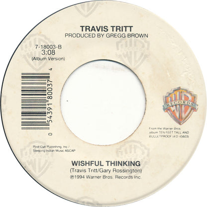 Travis Tritt : Between An Old Memory And Me (7", Single)