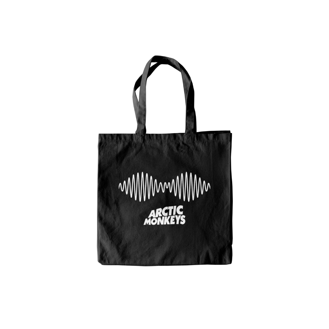 Black tote bag with Arctic Monkeys logo on a white background