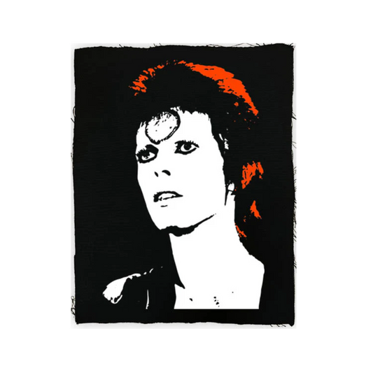 Stylized portrait with black, white, and orange colors on a textured black background