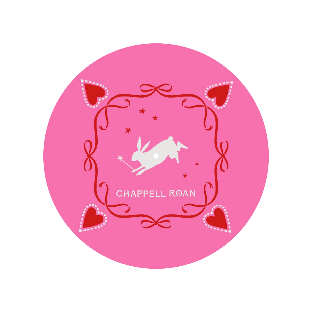 Circular logo with decorative frame and silhouette of a person on a pink background, featuring the brand 'Chappell Roan'.