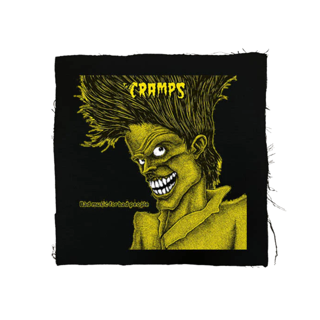 Patch with a stylized face and 'Cramps' text on a black background