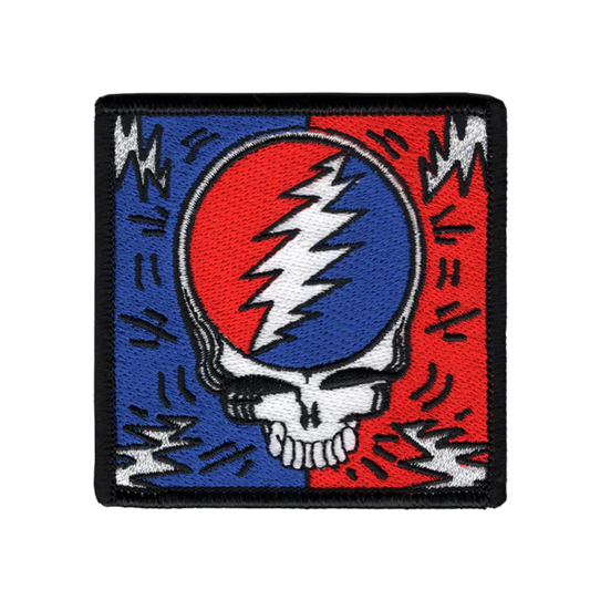 Patch with a skull and lightning bolt design on a red, blue, and white background.