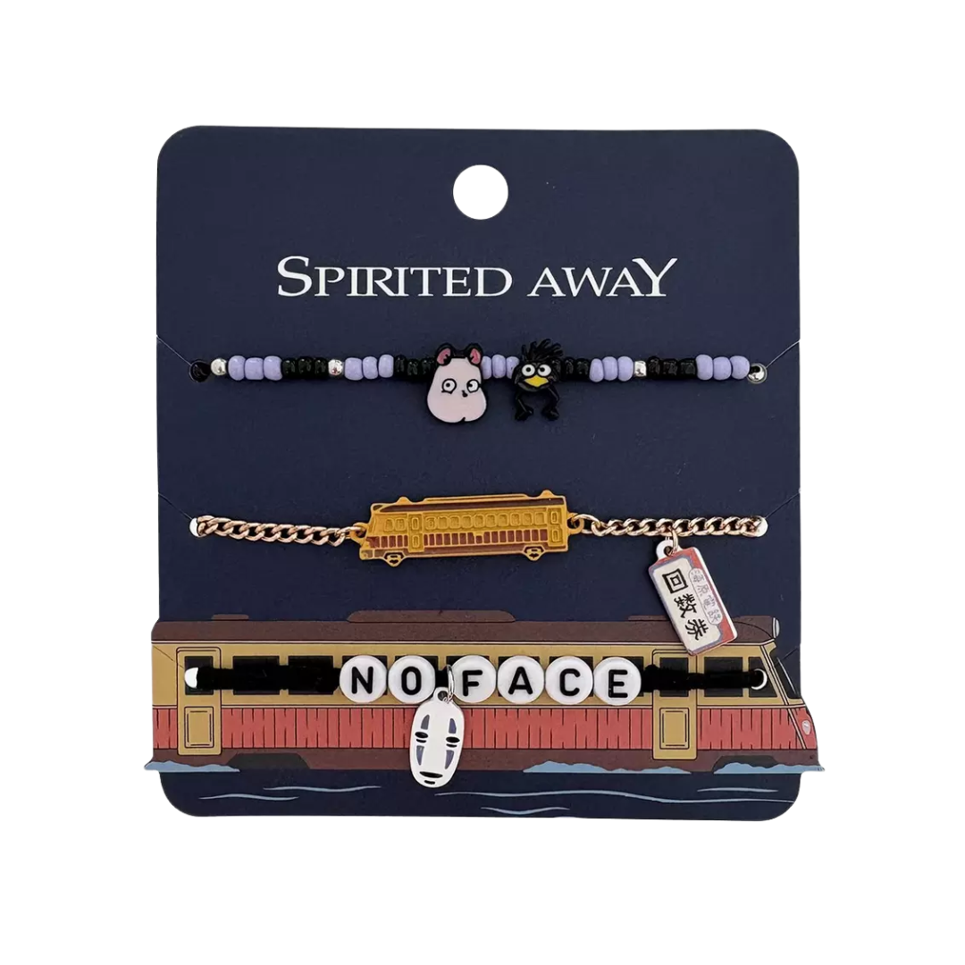 Two bracelets with charms on a 'Spirited Away' branded card.