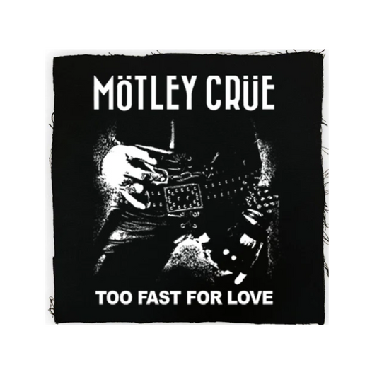 Album cover of 'Too Fast for Love' by Mötley Crüe with a person playing guitar.
