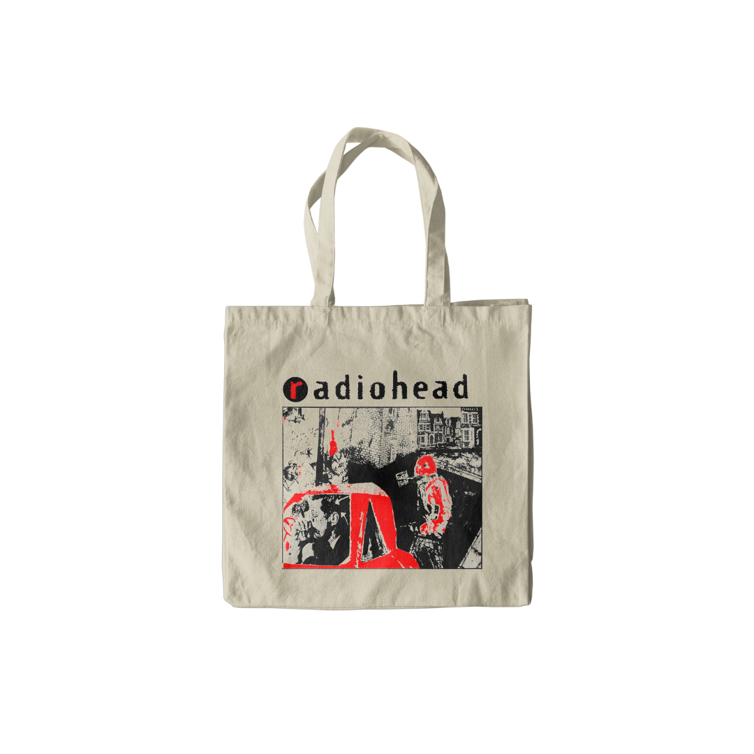 Tote bag with Radiohead logo and album cover design on a white background