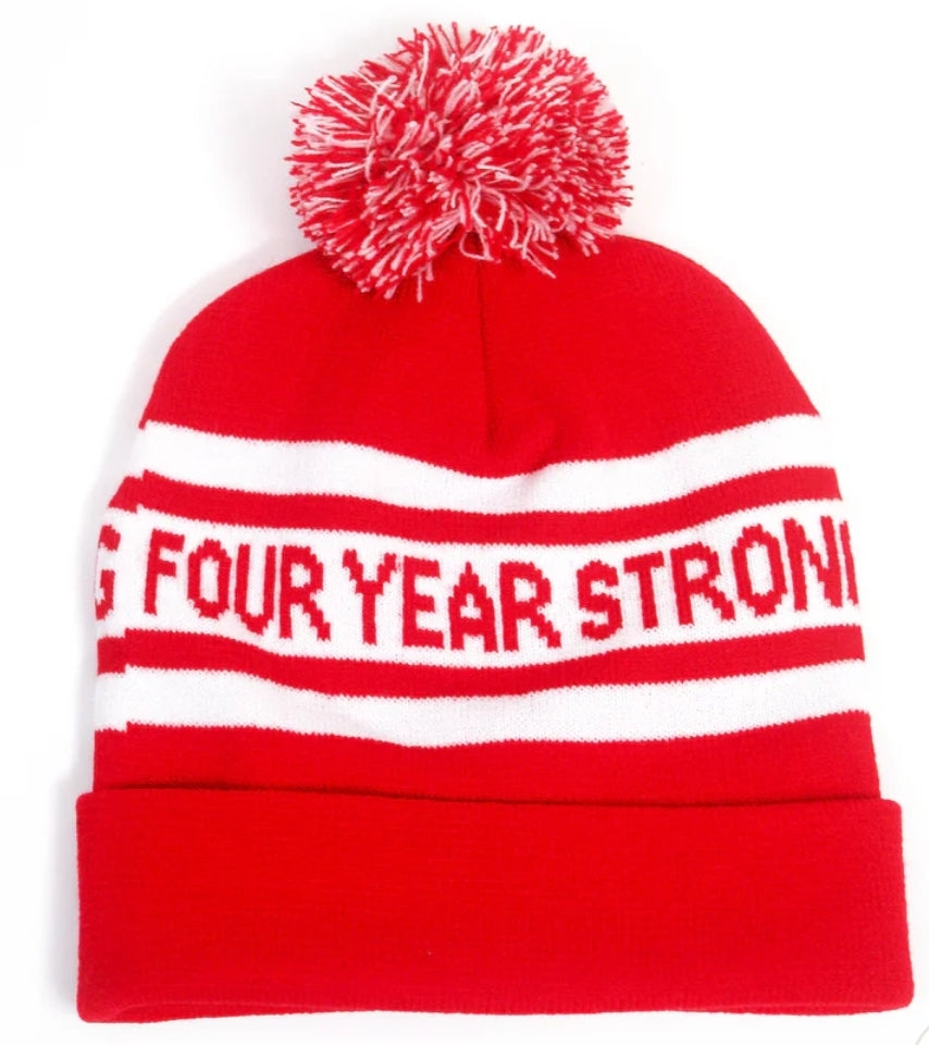 4 year strong read an white pom beanie