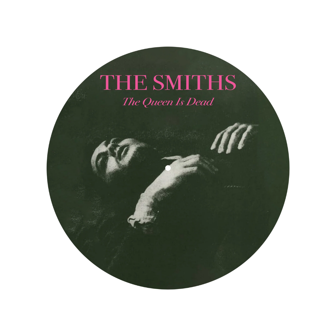 Album cover for 'The Queen Is Dead' by The Smiths with a black and white image of a person holding their head.