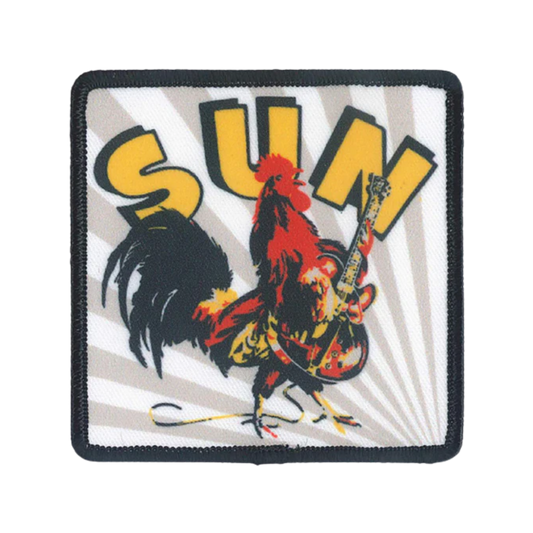 Patch with a rooster playing guitar and the word 'SUN' on a white background