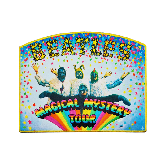 Colorful poster for The Beatles' 'Magical Mystery Tour' with four band members and rainbow design.