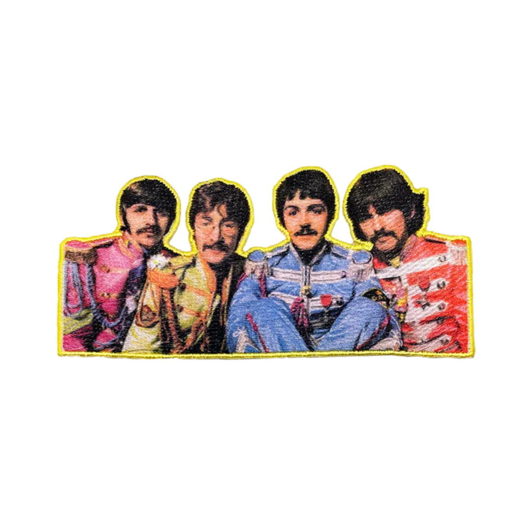 Four individuals in colorful outfits with a yellow border on a white background