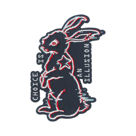 Embroidered patch of a rabbit with 'Choice is an Illusion' text on a white background