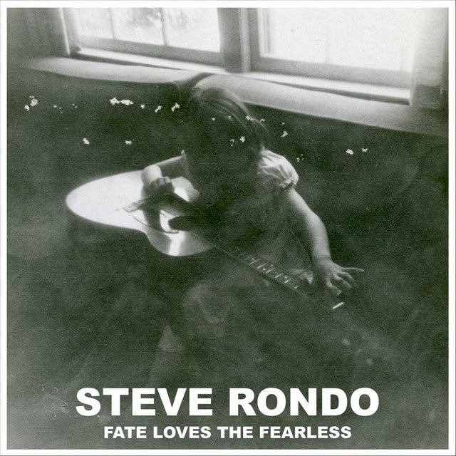 Black and white album cover with a child playing guitar, featuring the text 'Steve Rondo Fate Loves The Fearless'.